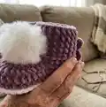 Plush Booties with Pompoms Pattern step 3 - details and accessories