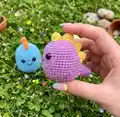 Colourful Mini Dino Amigurumi Pattern step 4 - final assembly and finishing